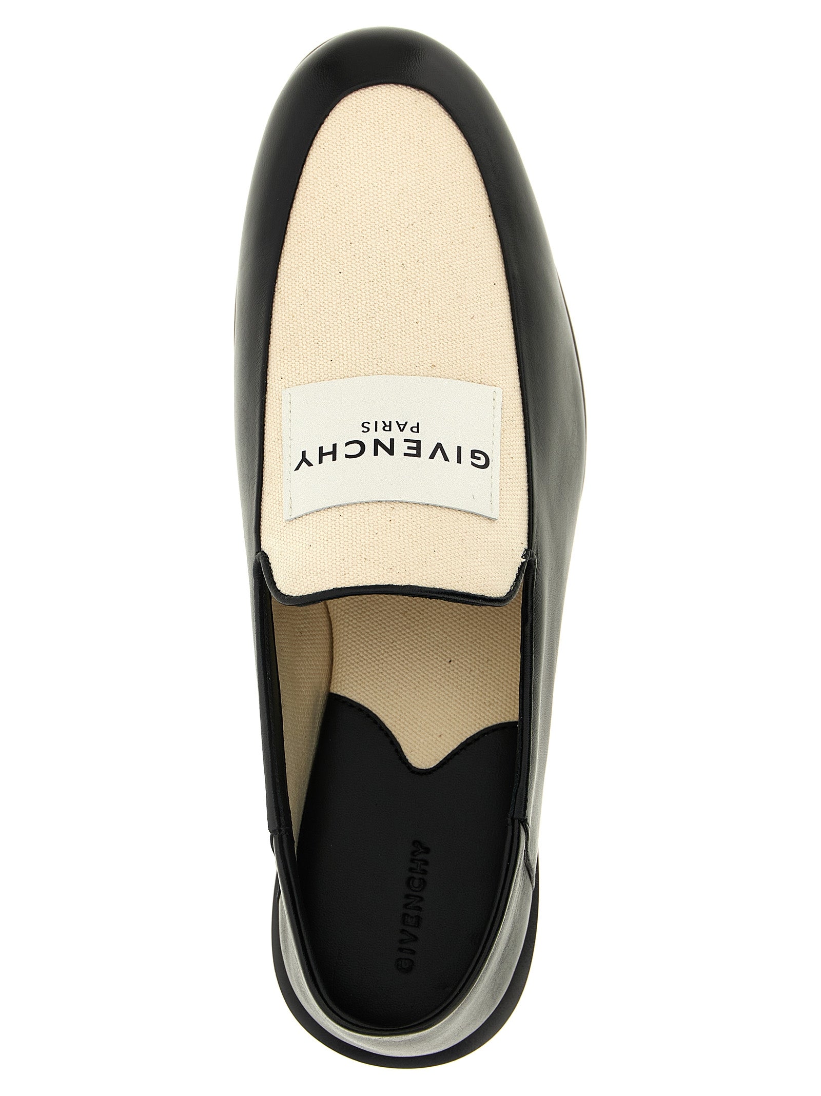 Mocassins slip-on noirs en cuir d'agneau Givenchy, élégants et raffinés, avec semelle en caoutchouc et design épuré.