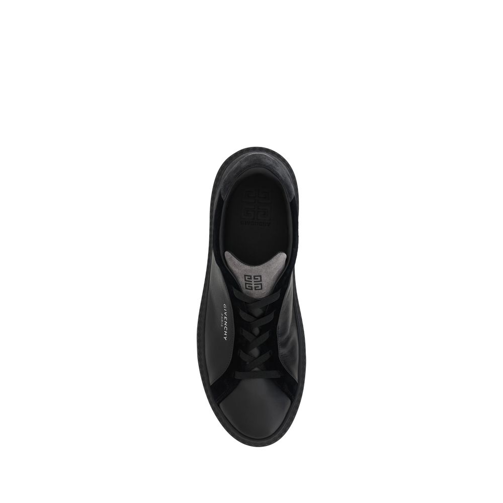 Chaussures sneakers Givenchy G Set en cuir noir, vue de face, avec détails en relief et logo de la marque visible.