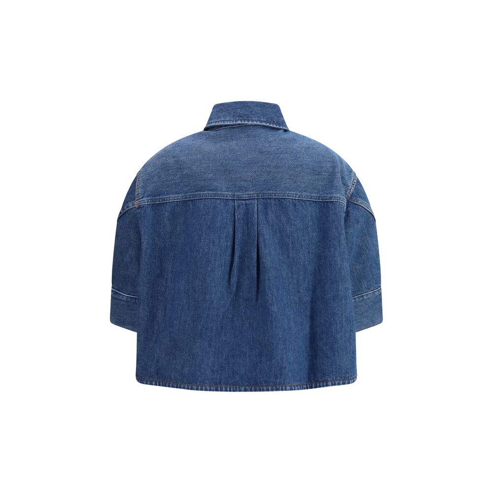 Chemise en denim bleu Givenchy avec col classique et boutons, vue de face, tissu denim texturé.