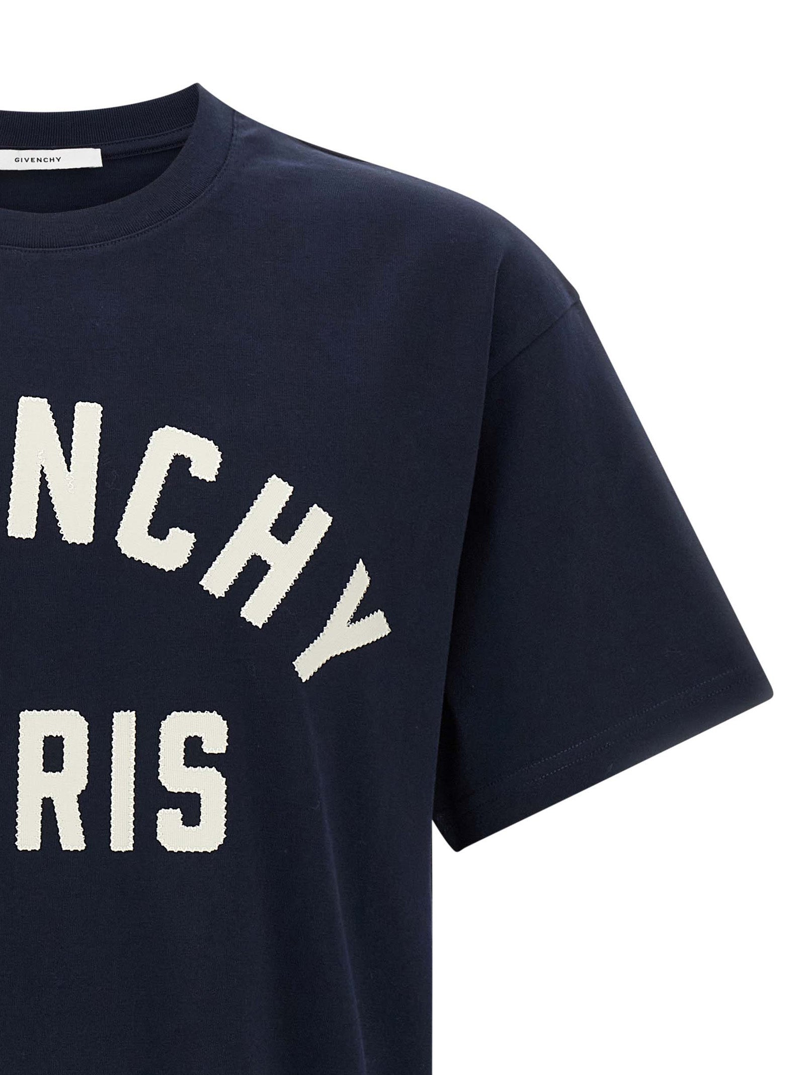 T-shirt en coton bleu Givenchy, vêtement décontracté avec logo Givenchy visible sur le devant.