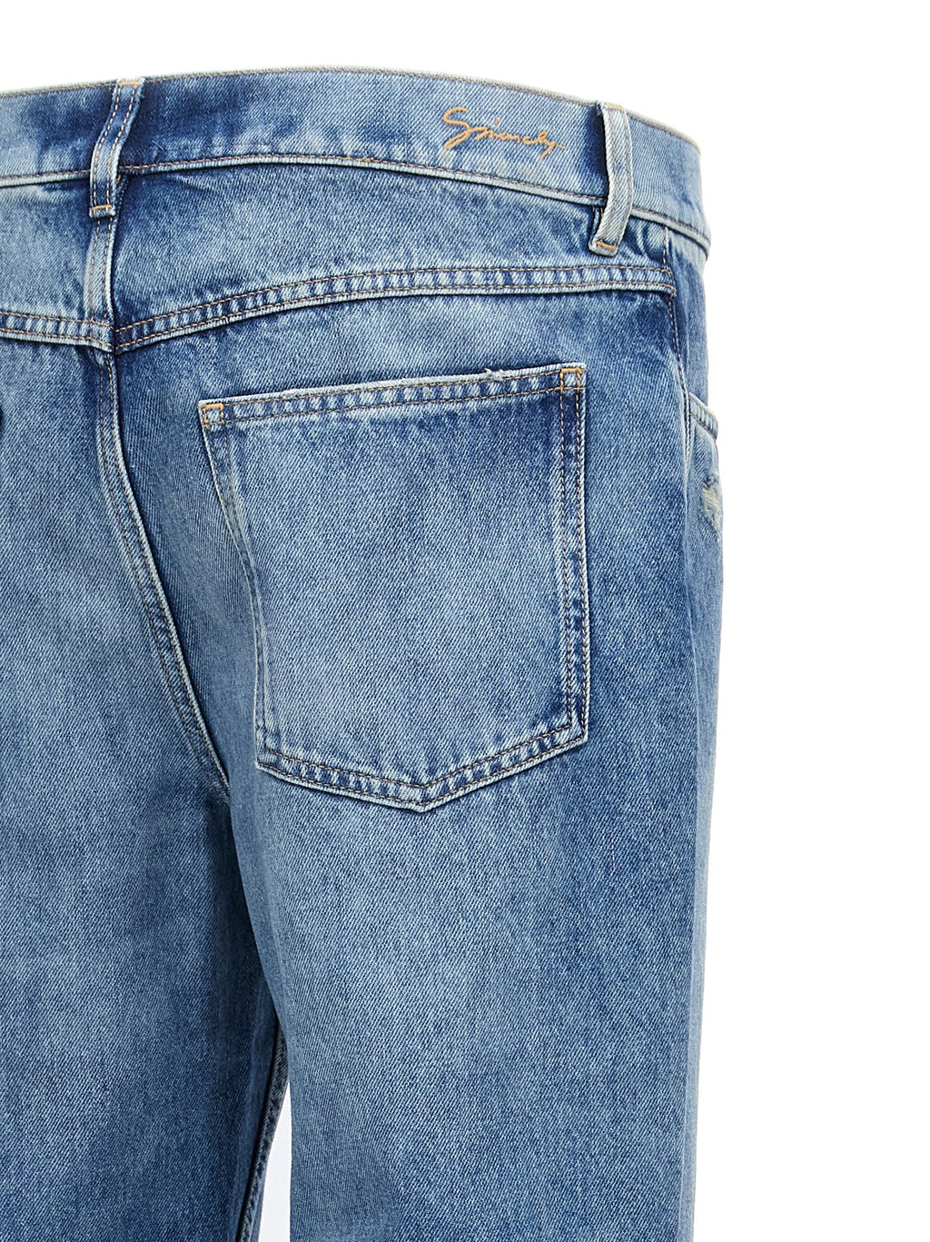 Jeans droits en coton bleu de la marque Givenchy, vue de face, avec détails classiques et coupe élégante.