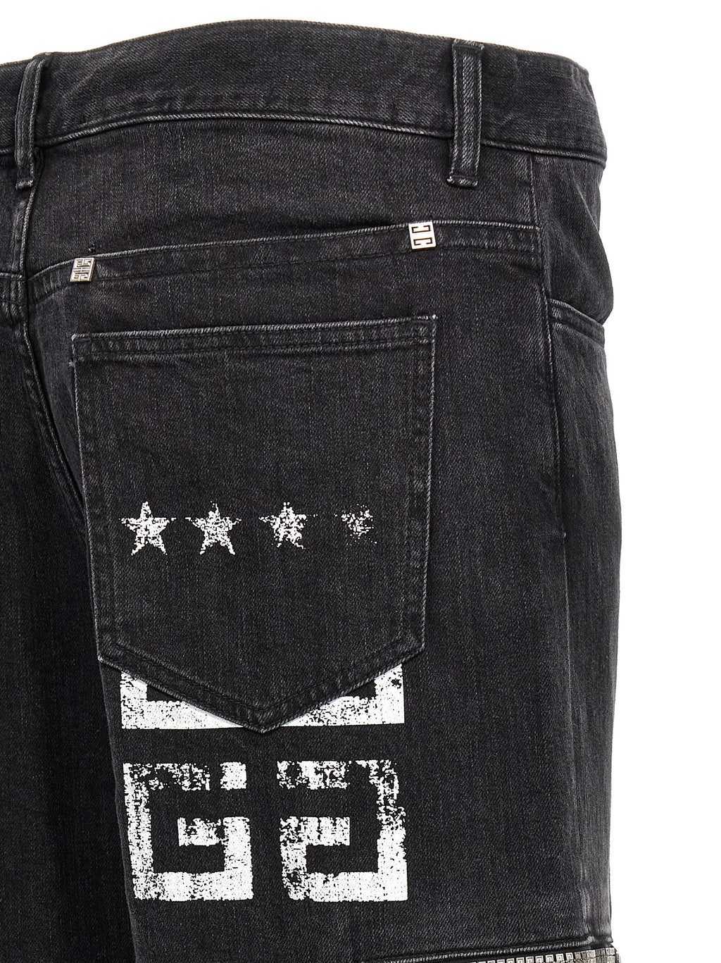 Jeans en denim noir Givenchy, coupe classique avec détails en coton, mode élégante et tendance pour homme ou femme.