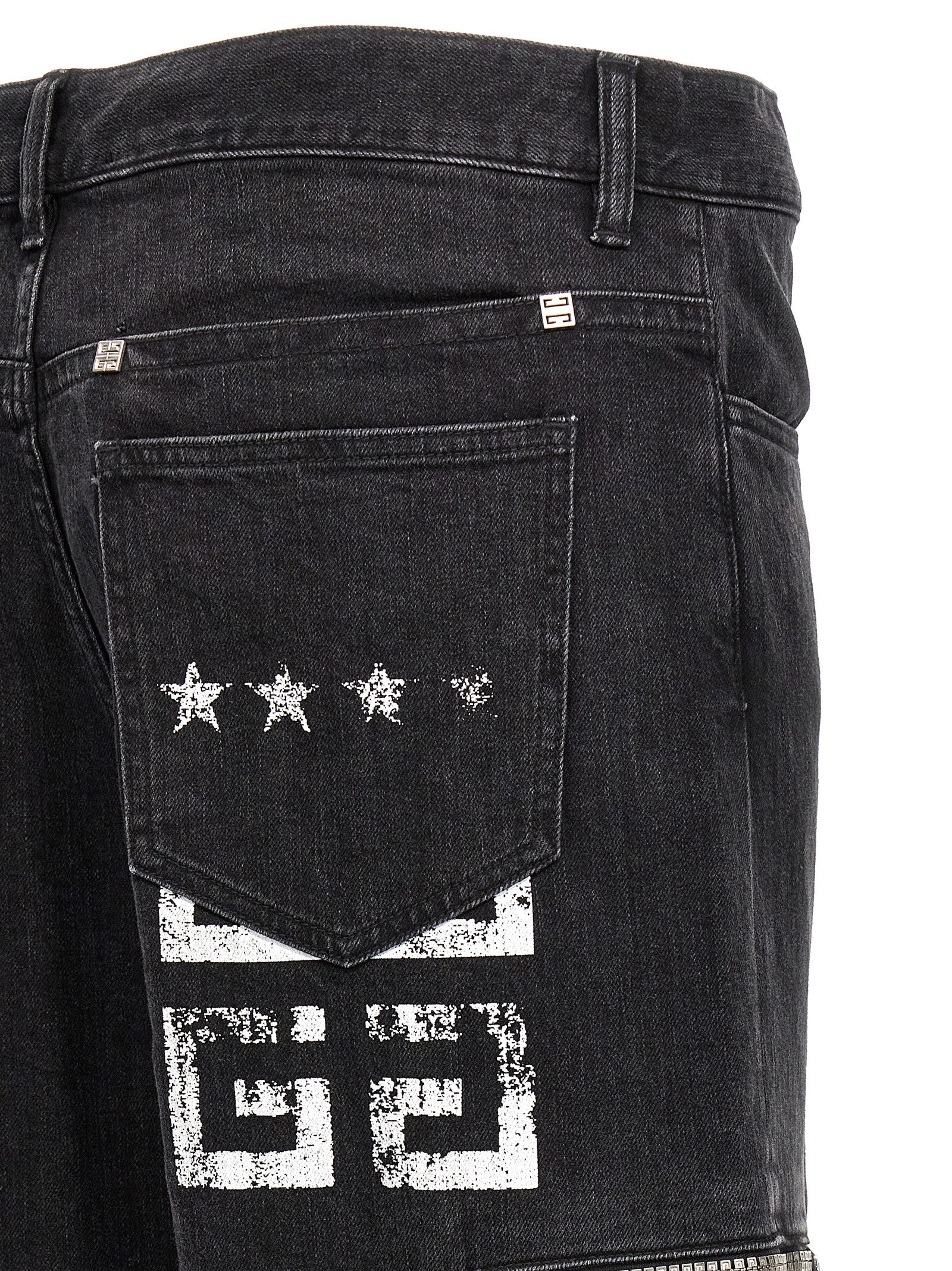 Jeans en denim noir Givenchy, coupe classique avec détails en coton, mode élégante et tendance pour homme ou femme.