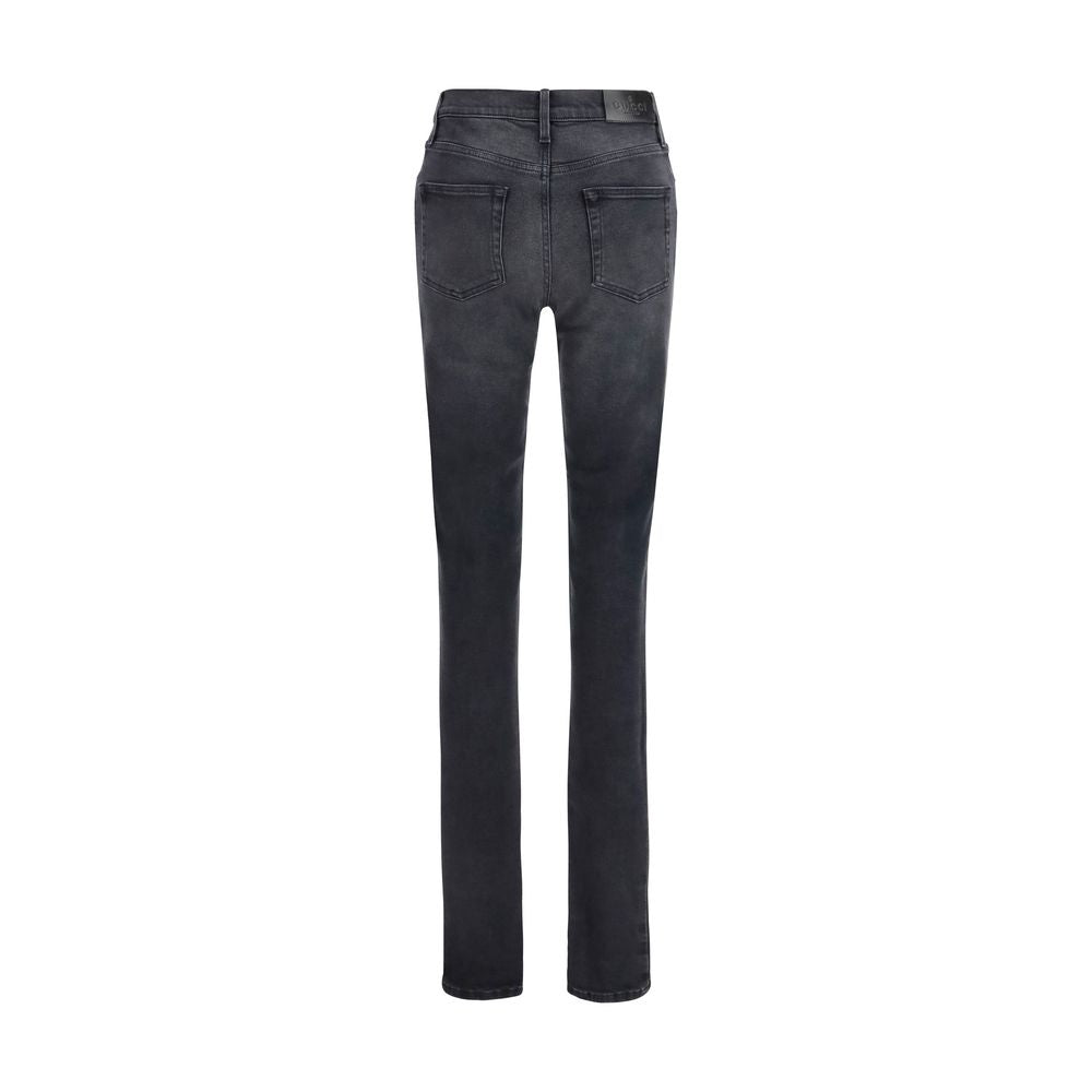 Jeans skinny en coton noir de Gucci, mode urbaine et élégante, avec coupe ajustée et détails classiques.