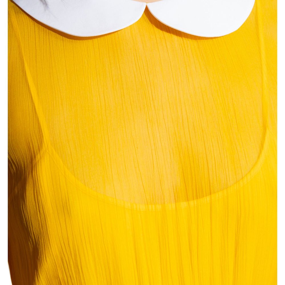 Robe décontractée bicolore en acétate Gucci, style élégant et sophistiqué, avec coupe fluide et détails modernes.