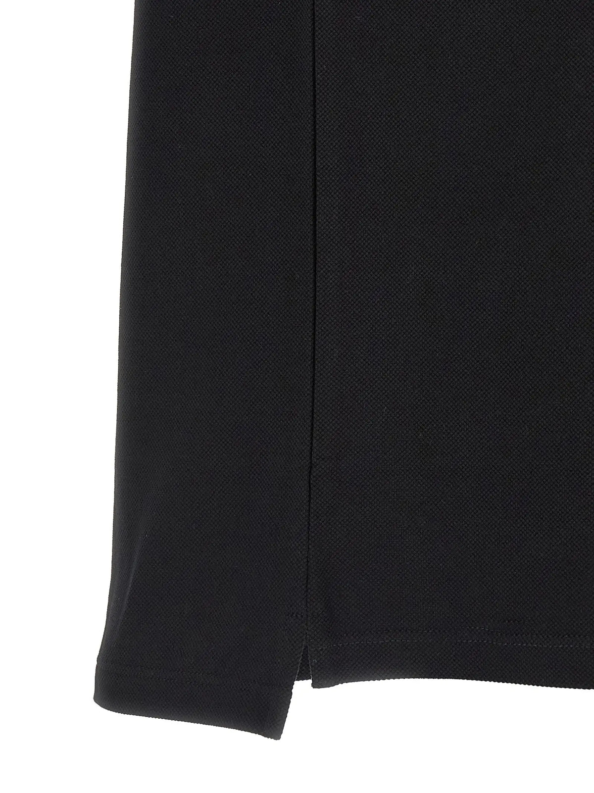 Polo gucci noir en coton avec tissage texturé subtil et ourlet droit propre