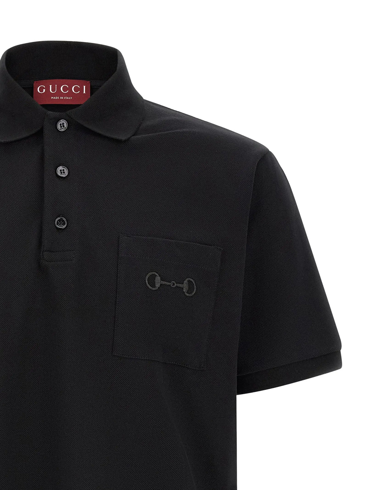 Polo gucci noir en coton avec broderie cheval subtile sur la poche poitrine et boutons assortis