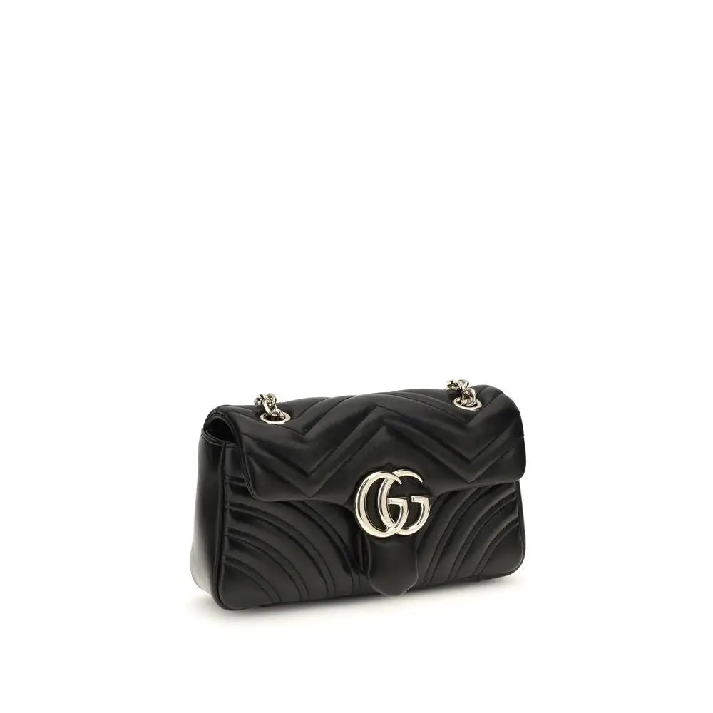 Sac bandoulière gucci marmont noir en cuir matelassé avec logo gg argenté et chaîne argentée en lamb ovis aries