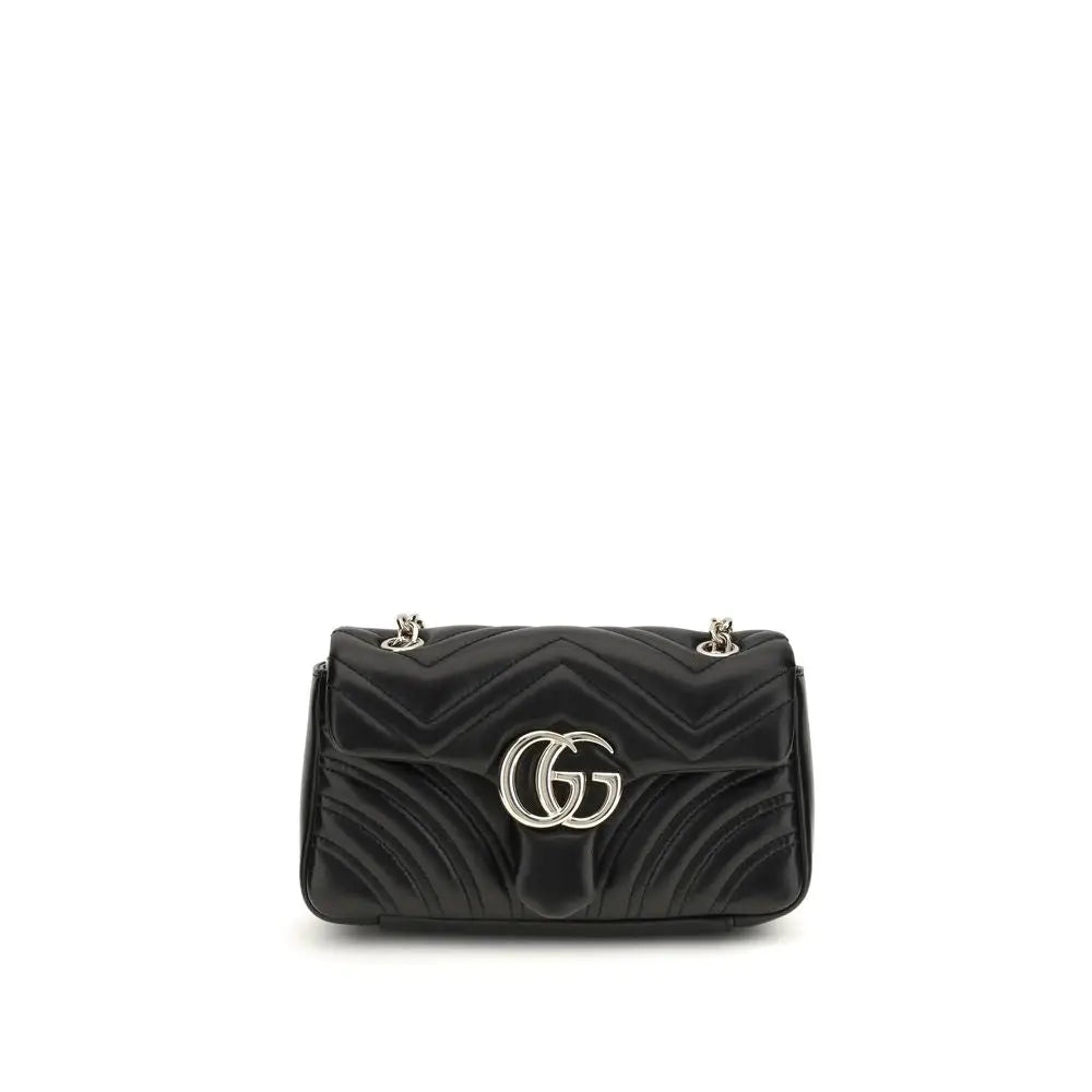 Sac à bandoulière gucci marmont noir en cuir agneau matelassé avec fermoir argenté logo gg entrelacé