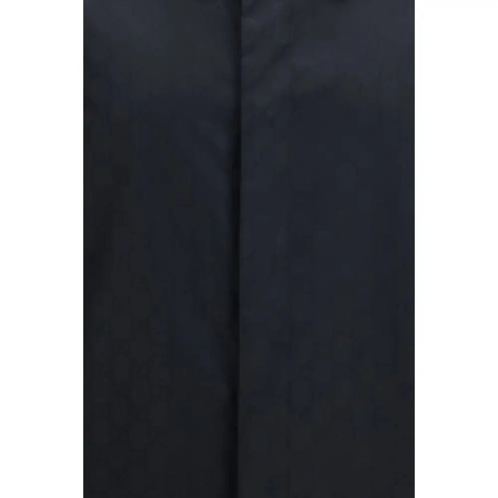 Veste gucci noire en polyamide avec léger éclat et couture visible au centre vue de dos