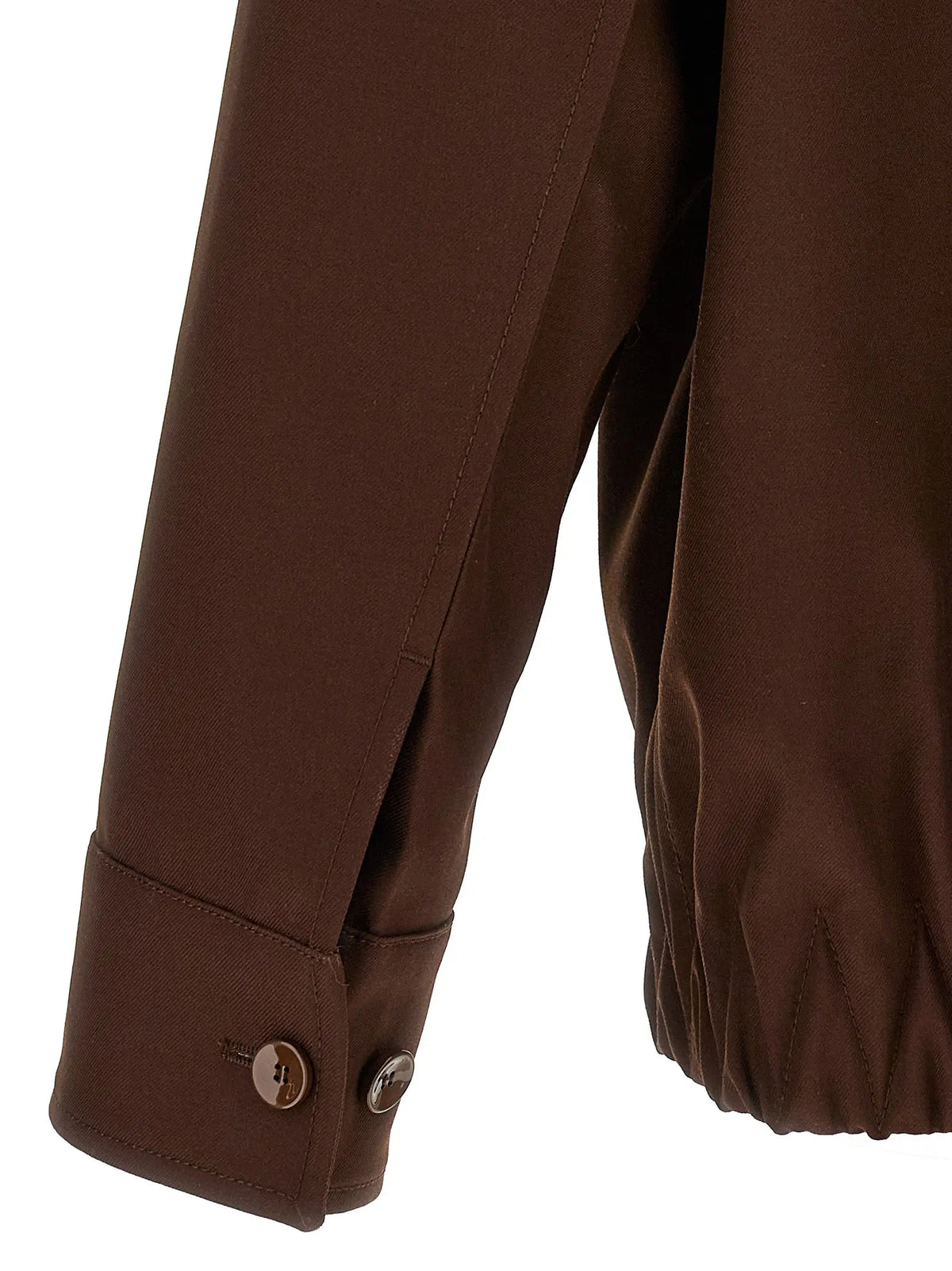 Manche de veste longue en laine marron gucci avec poignet boutonné et coutures discrètes