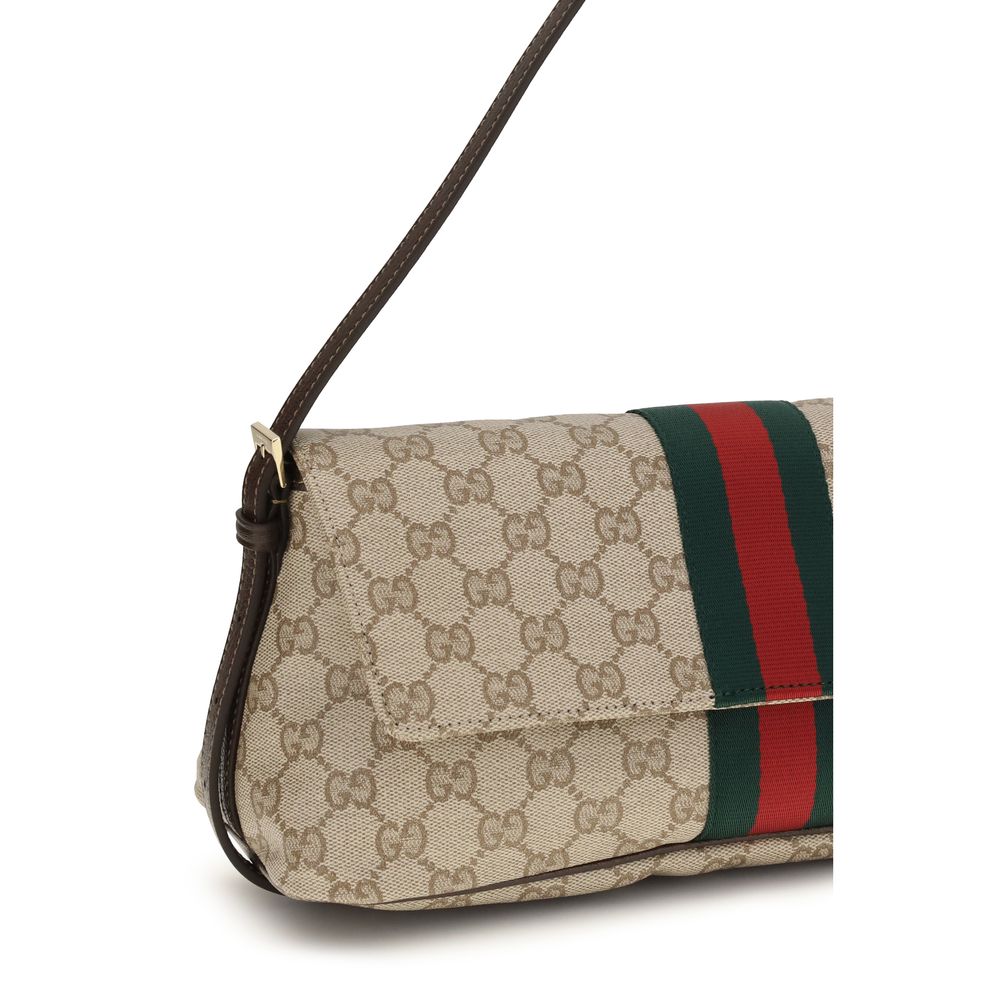 Sac à main en coton beige de Gucci avec détails élégants, idéal pour un style sophistiqué et tendance.