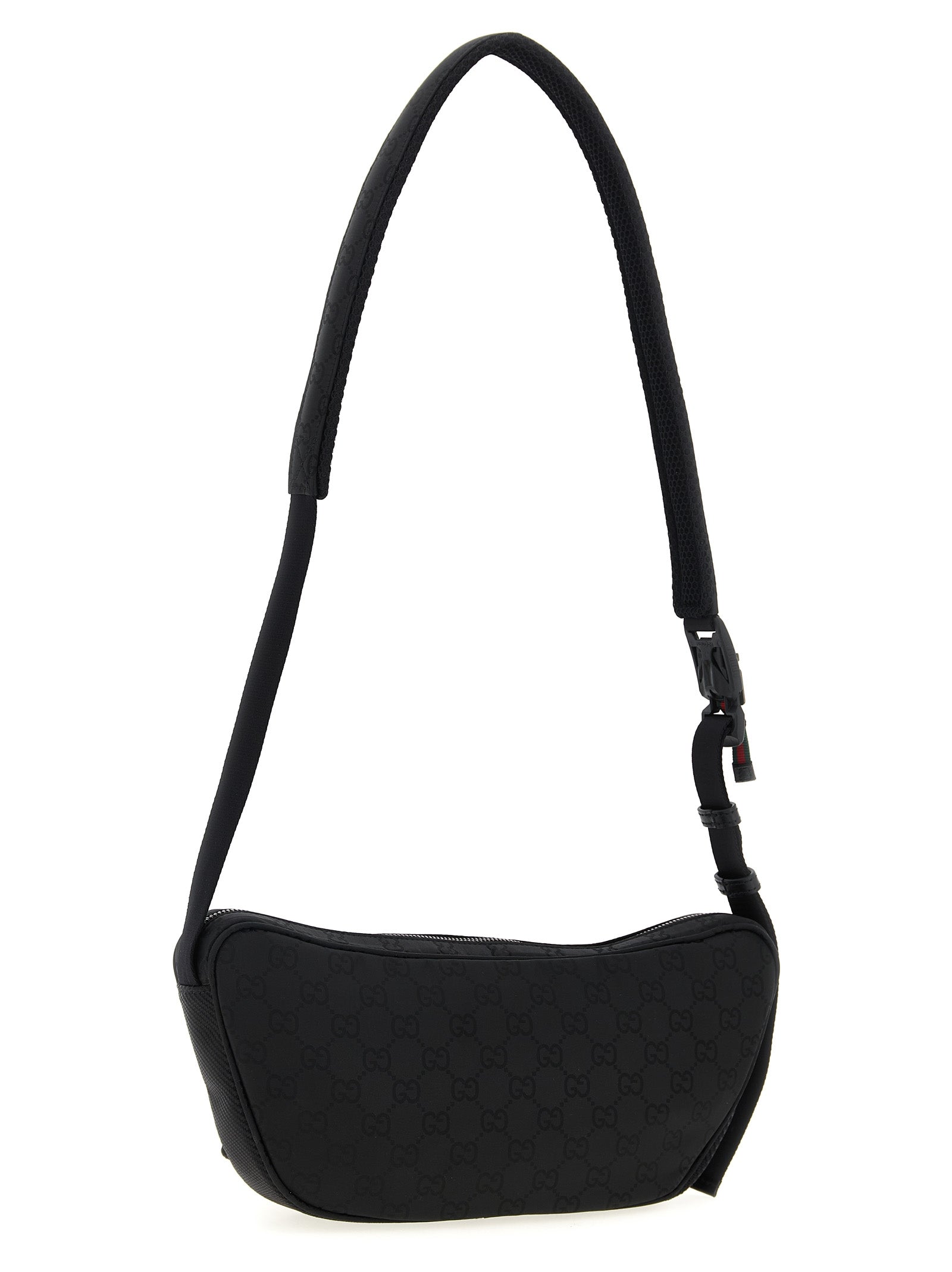 Sac à bandoulière en polyester noir de Gucci, avec logo et détails élégants visibles sur le sac.