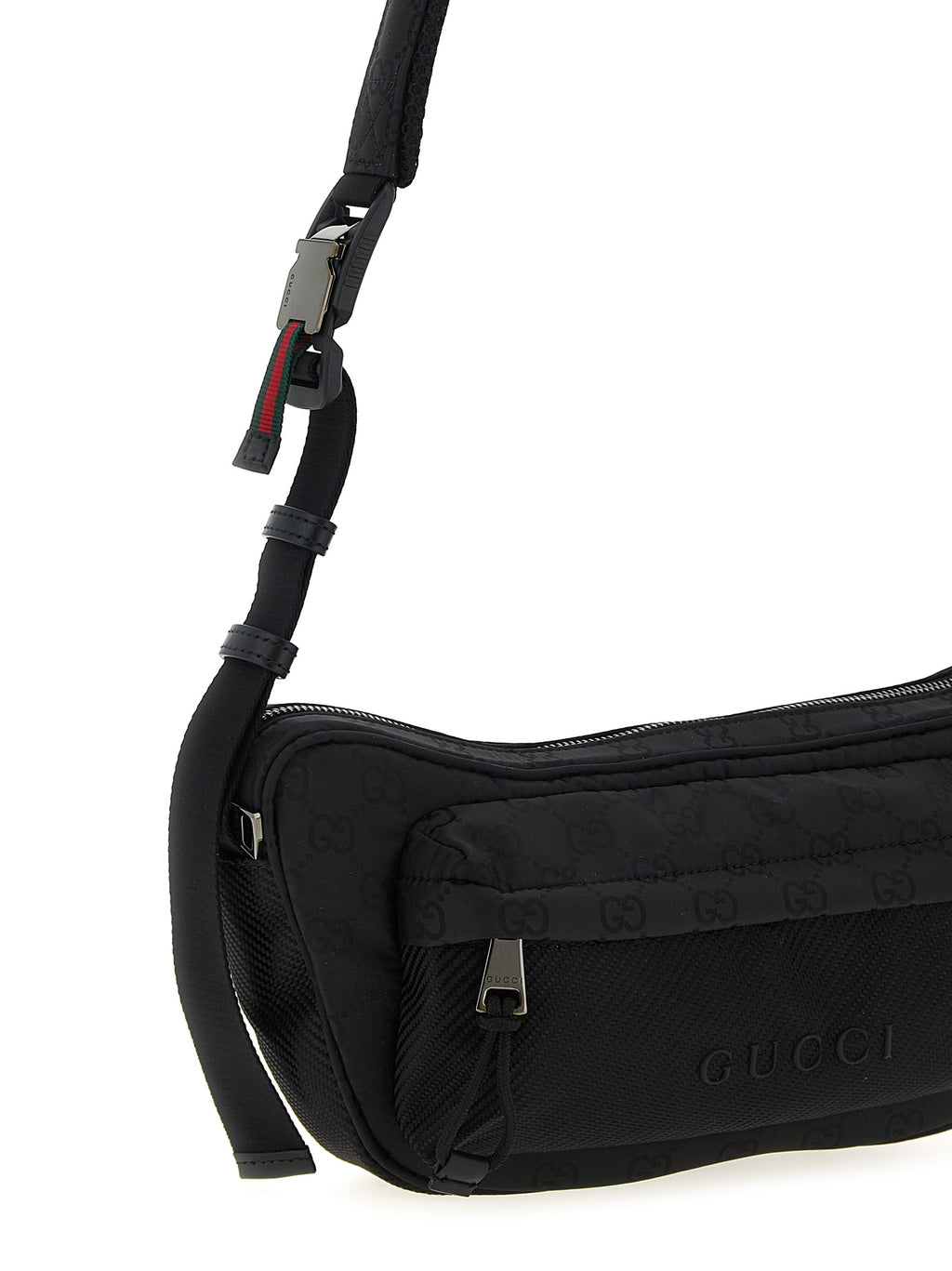 Sac banane Gucci en polyester noir, style croisé, avec logo distinctif et détails élégants, idéal pour un look moderne et pratique.