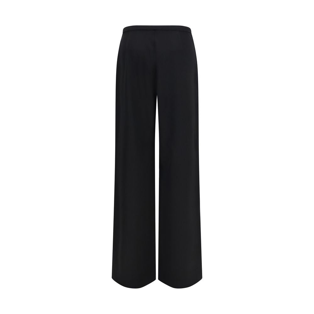 Pantalon décontracté Gucci en laine noire Oves Aries, style casual, avec coupe élégante et détails modernes.