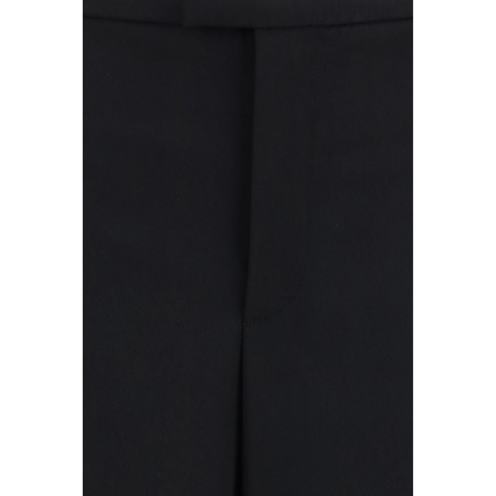 Pantalons décontractés en laine noire Gucci Oves Aries, style casual avec coupe moderne, visibles avec détails de couture et taille ajustée.