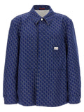 Veste en coton bleu Gucci pour motard, avec détails en cuir et fermeture éclair, mode élégante et tendance pour hommes ou femmes.