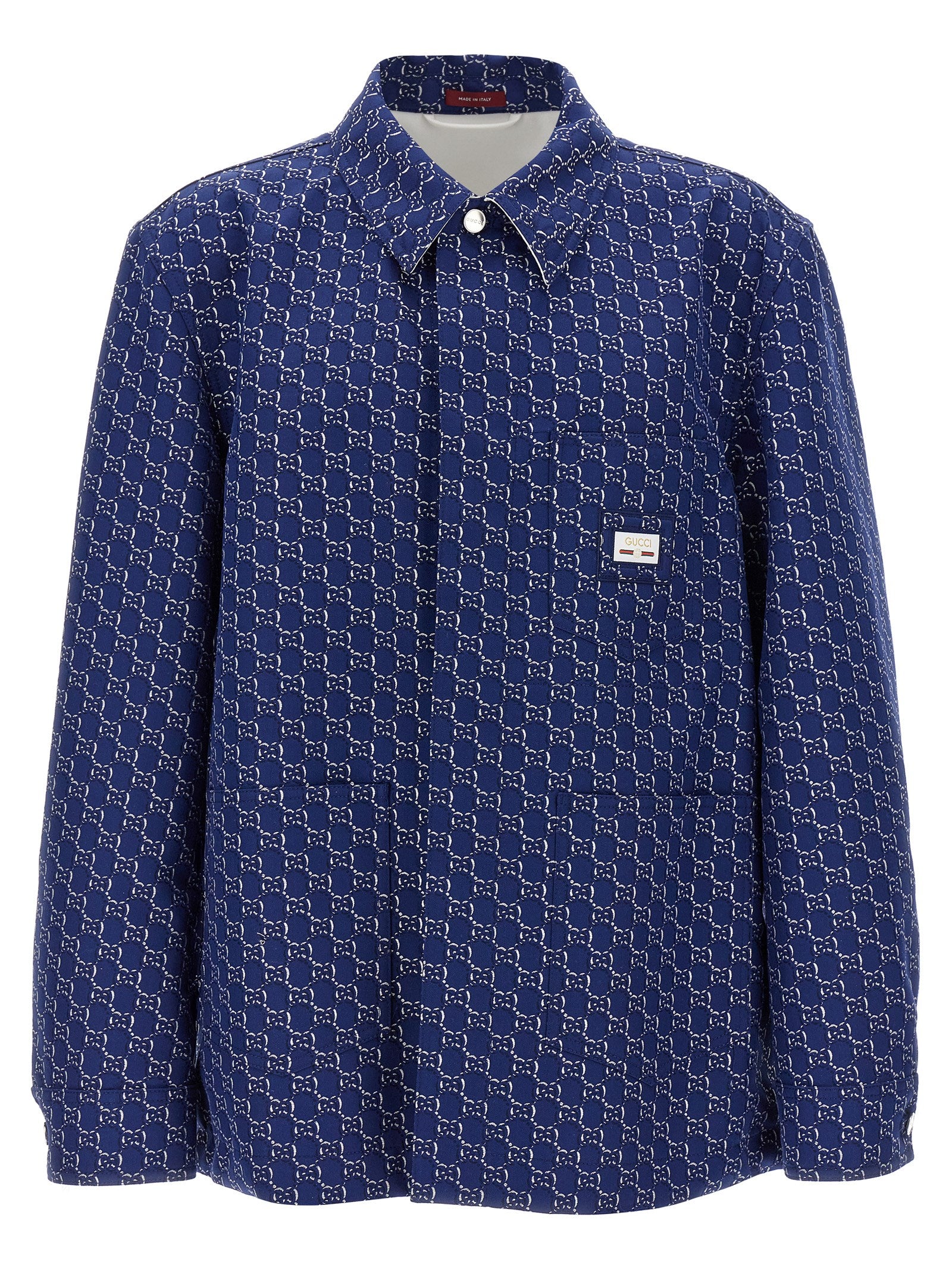 Veste en coton bleu Gucci pour motard, avec détails en cuir et fermeture éclair, mode élégante et tendance pour hommes ou femmes.