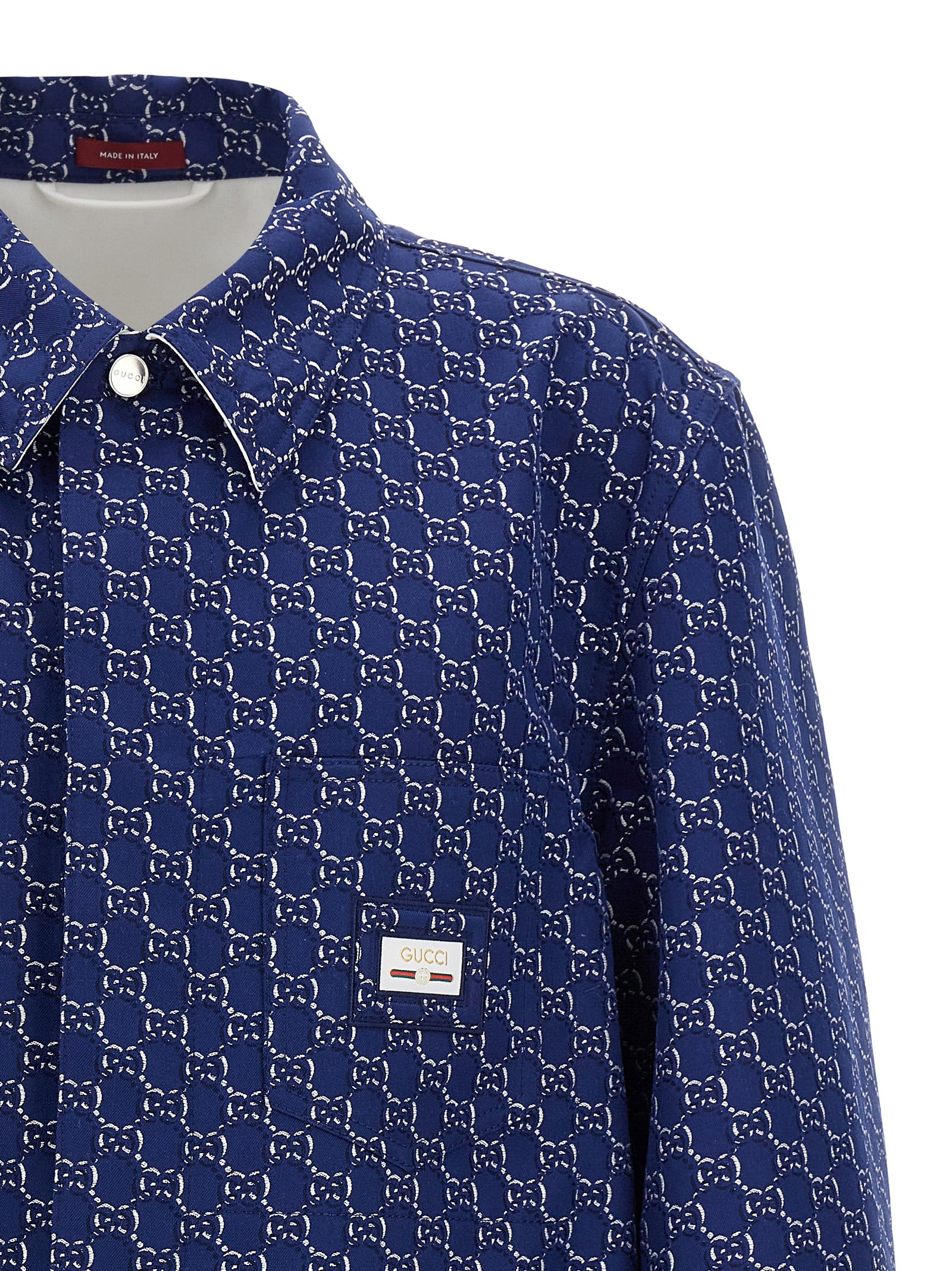 Veste en coton bleu Gucci pour motard, avec détails en cuir et zip, style tendance et élégance.