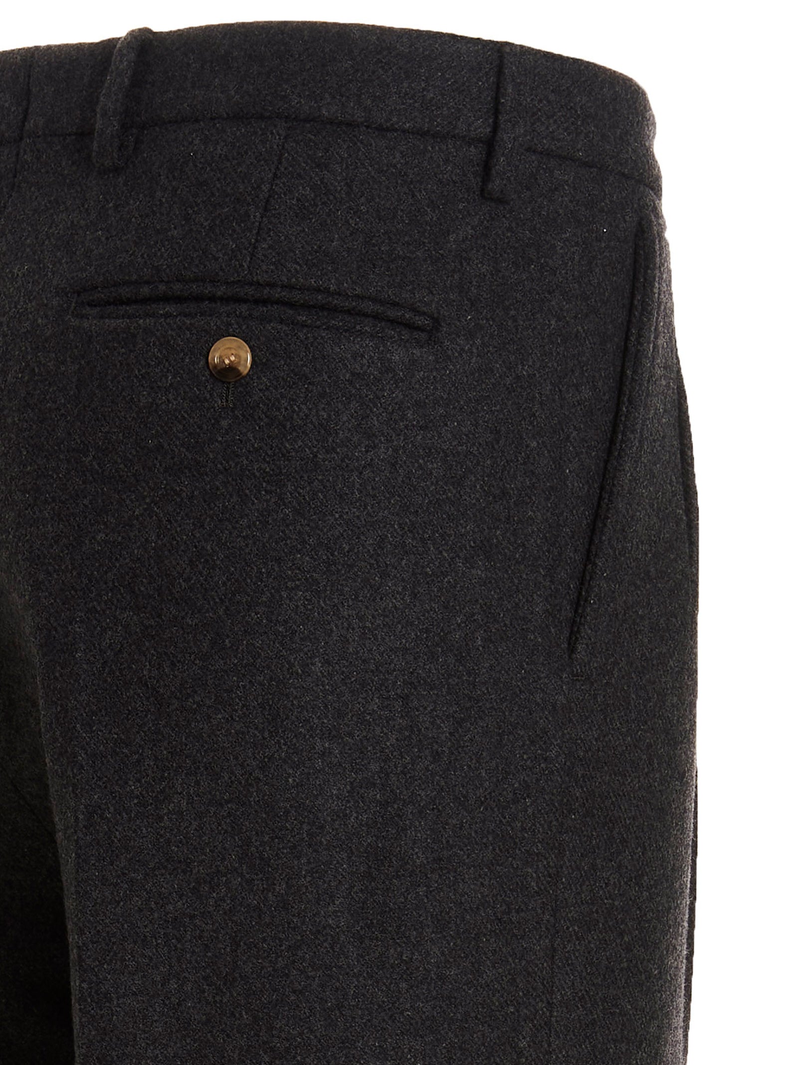 Pantalon en laine gris Gucci pour femme, coupe élégante et moderne, visible en détail dans l'image.