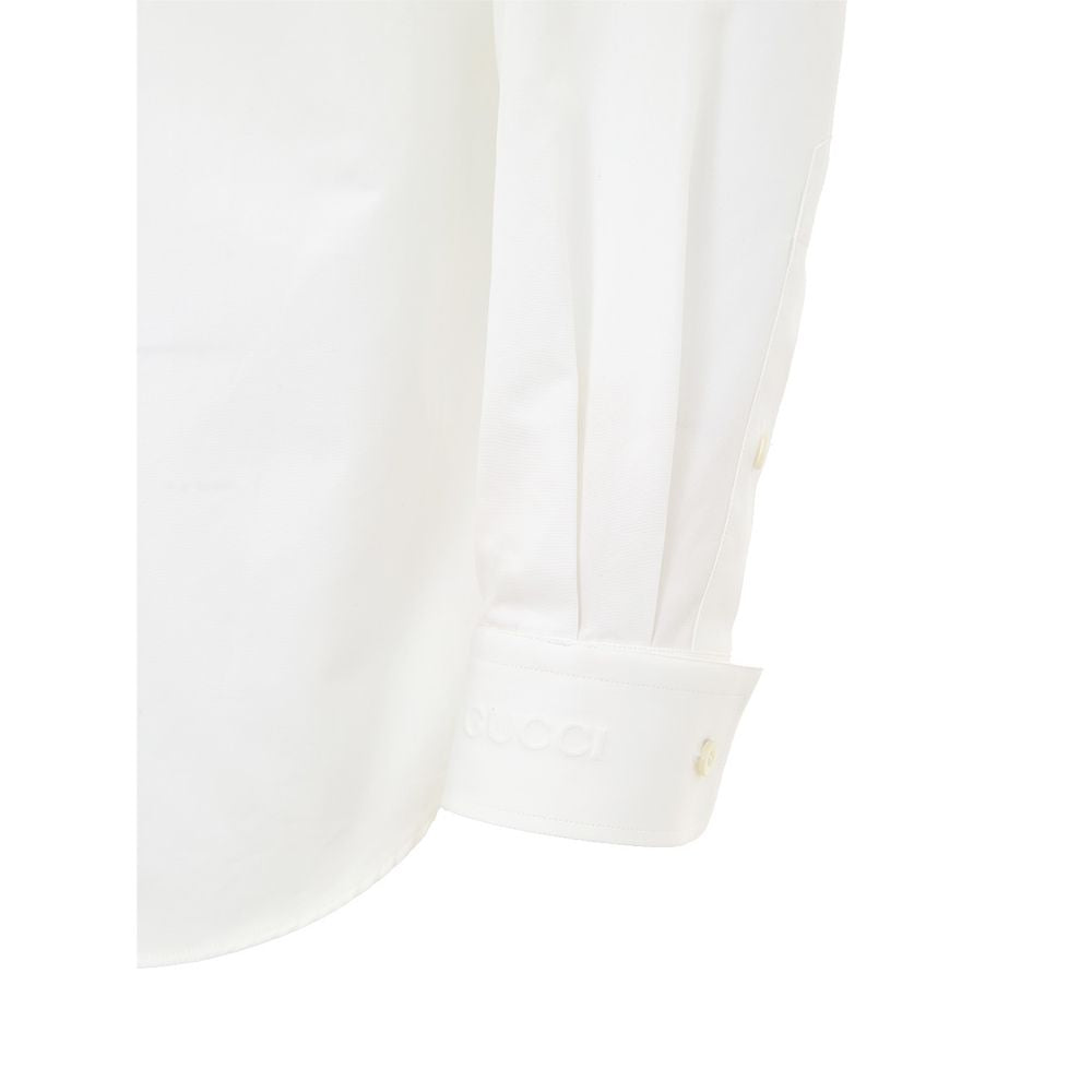 Chemise blanche en coton Gucci pour homme, col classique et manches longues, élégante et sophistiquée.