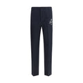 Pantalon décontracté en coton bleu de Gucci, style casual, avec coupe confortable et détails modernes, porté par un modèle.
