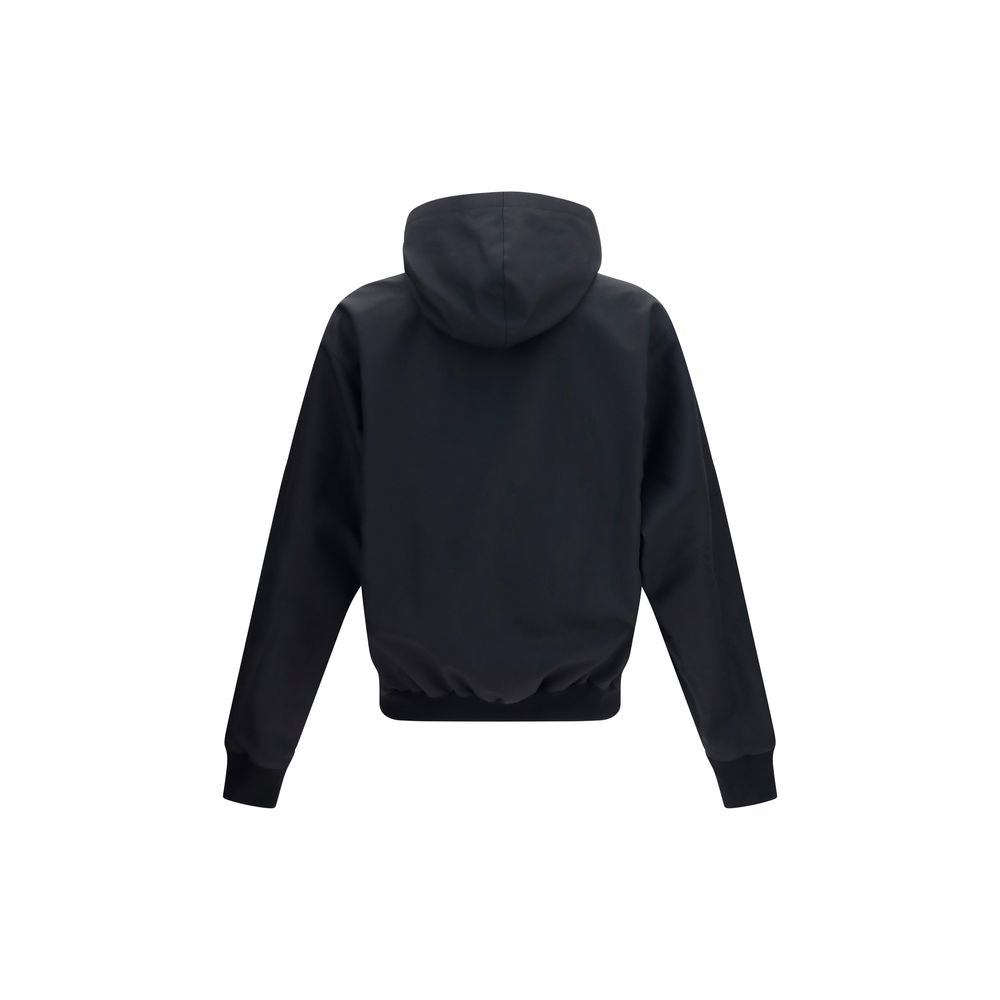 Veste en polyester noire de Gucci, élégante et moderne, avec détails de la marque visible sur la surface.
