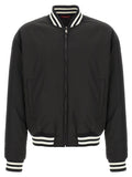 Veste bomber bicolore en polyester Gucci, style moderne avec détails colorés, vue de face sur un mannequin.