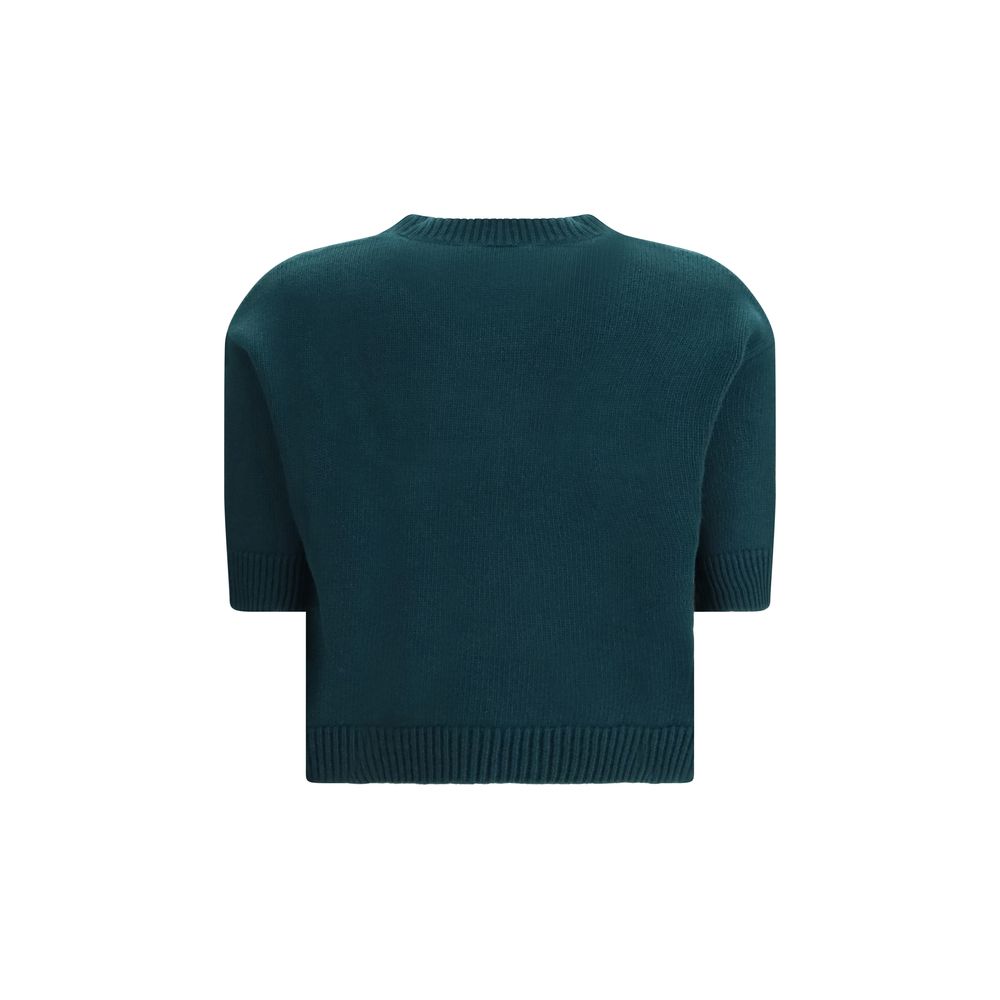 Sweat-shirt en laine bicolore Gucci, coupe décontractée avec logo Gucci visible, porté sur un mannequin.