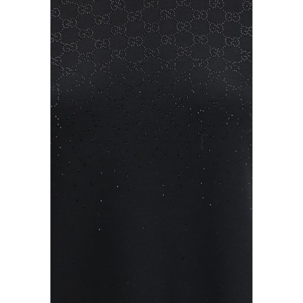 Robe décontractée en laine noire Gucci Oves Aries, style casual, portée avec col rond et manches longues.