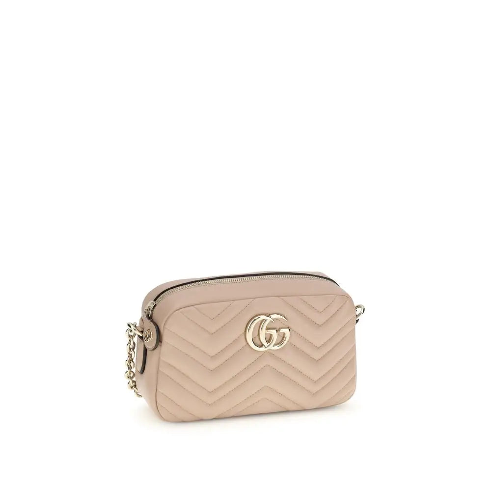 Sac caméra gucci marmont matelassé beige avec logo gg doré et bandoulière chaîne dans le sac à main multicolore Gucci lamb ovis aries