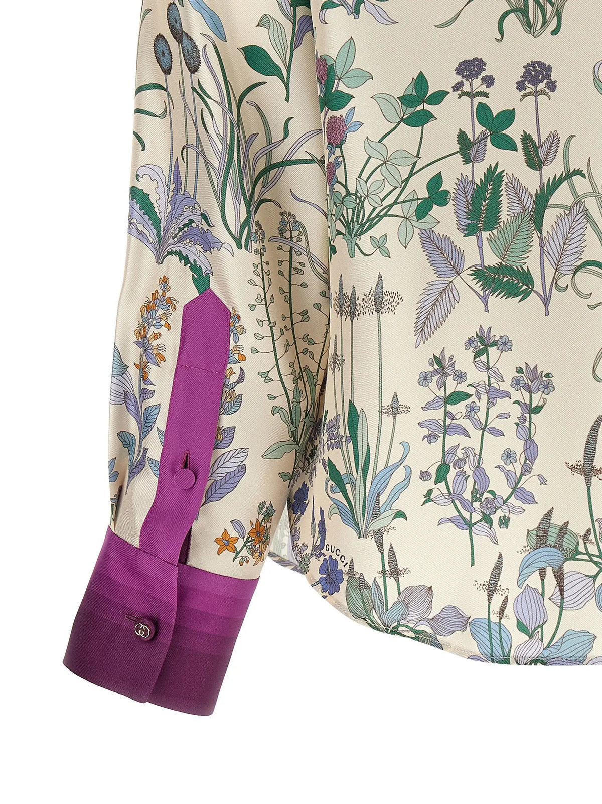 Blouse gucci en soie crème à imprimé botanique délicat avec poignets violets vibrants et détails de boutons
