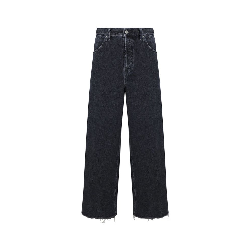 Jeans en denim noir Gucci en coton, coupe classique, visible avec détails de couture et logo Gucci.
