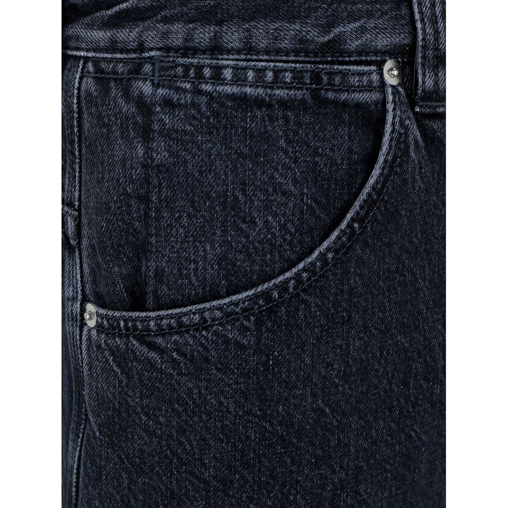 Jeans en denim noir Gucci en coton, coupe classique, avec logo Gucci discret sur la poche arrière.