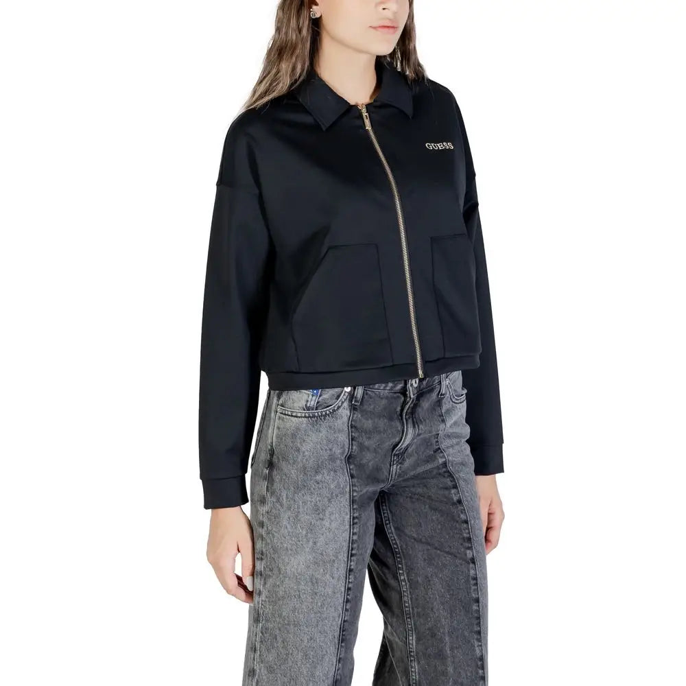 Veste courte guess active noire en polyamide avec fermeture éclair dorée et deux poches avant
