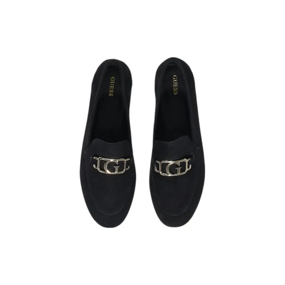Guess black leather platform pumps with black suede loafers and a silver toned g logo buckle