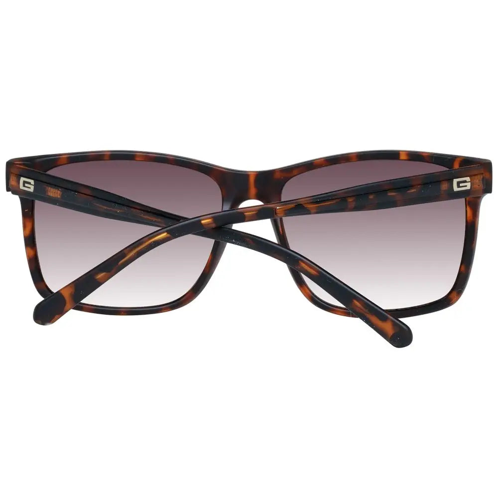 Lunettes de soleil guess en plastique marron motif écaille avec verres dégradés marron design moderne rectangulaire