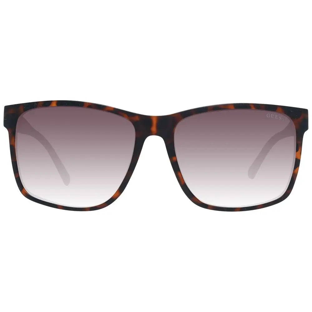 Lunettes de soleil guess en plastique marron avec monture écaille de tortue et verres dégradés marron à clair