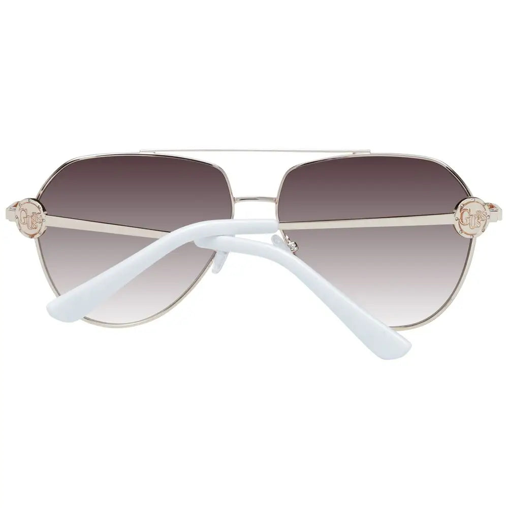 Lunettes de soleil guess gold metal argentées aviator avec verres dégradés marron et embouts blancs dorés logo