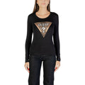 T-shirt à manches longues en coton noir Guess, coupe classique, tissu doux et confortable, vue de face.