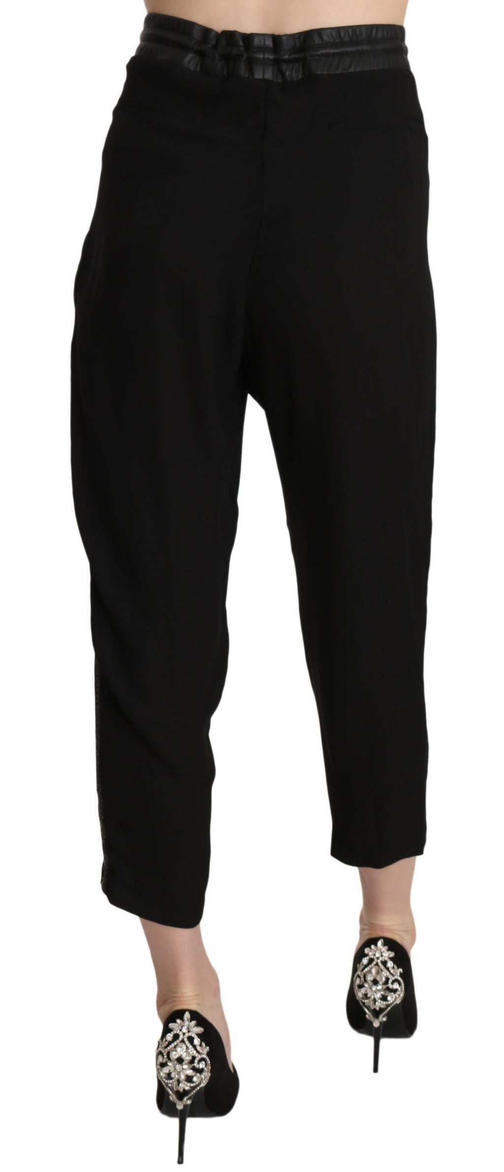 Pantalon femme Guess en polyester noir à taille haute, coupe cropped, style élégant et moderne.
