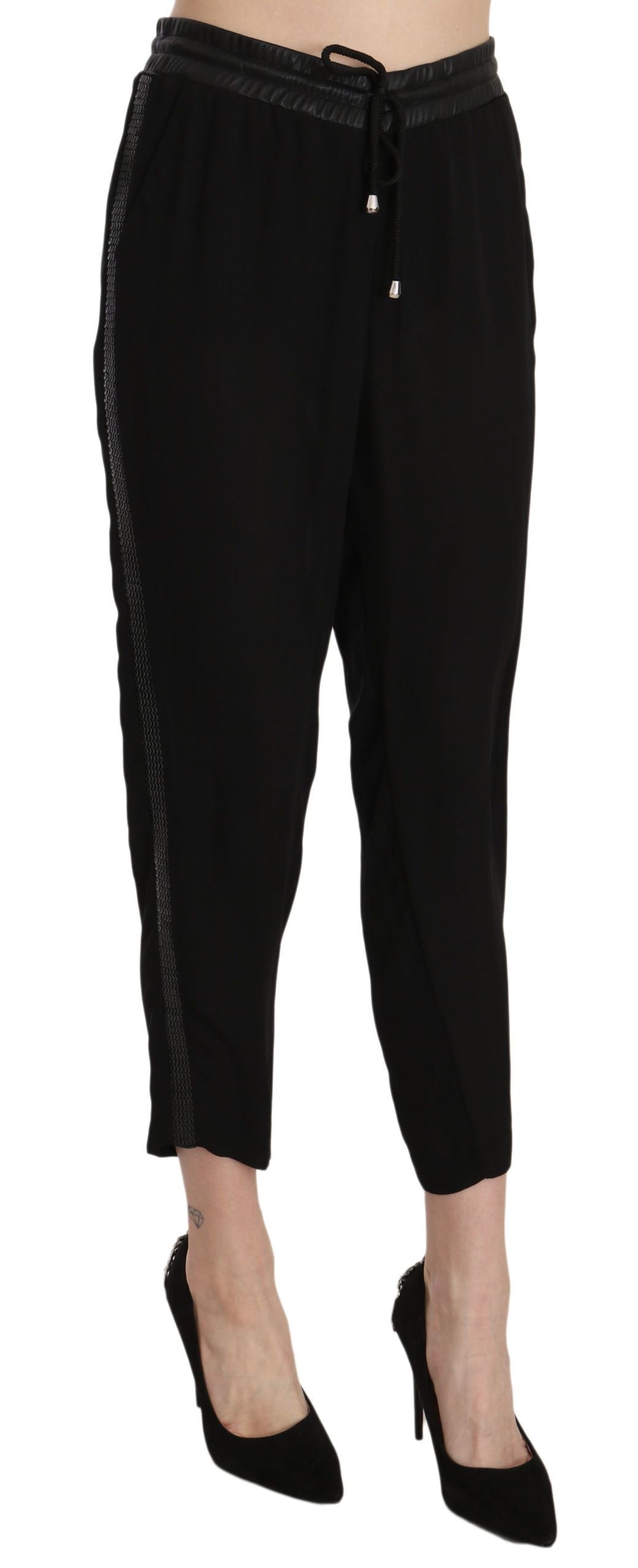 Pantalons cropped en polyester noir à taille haute de la marque Guess, vue de face, avec coupe élégante et finition soignée.
