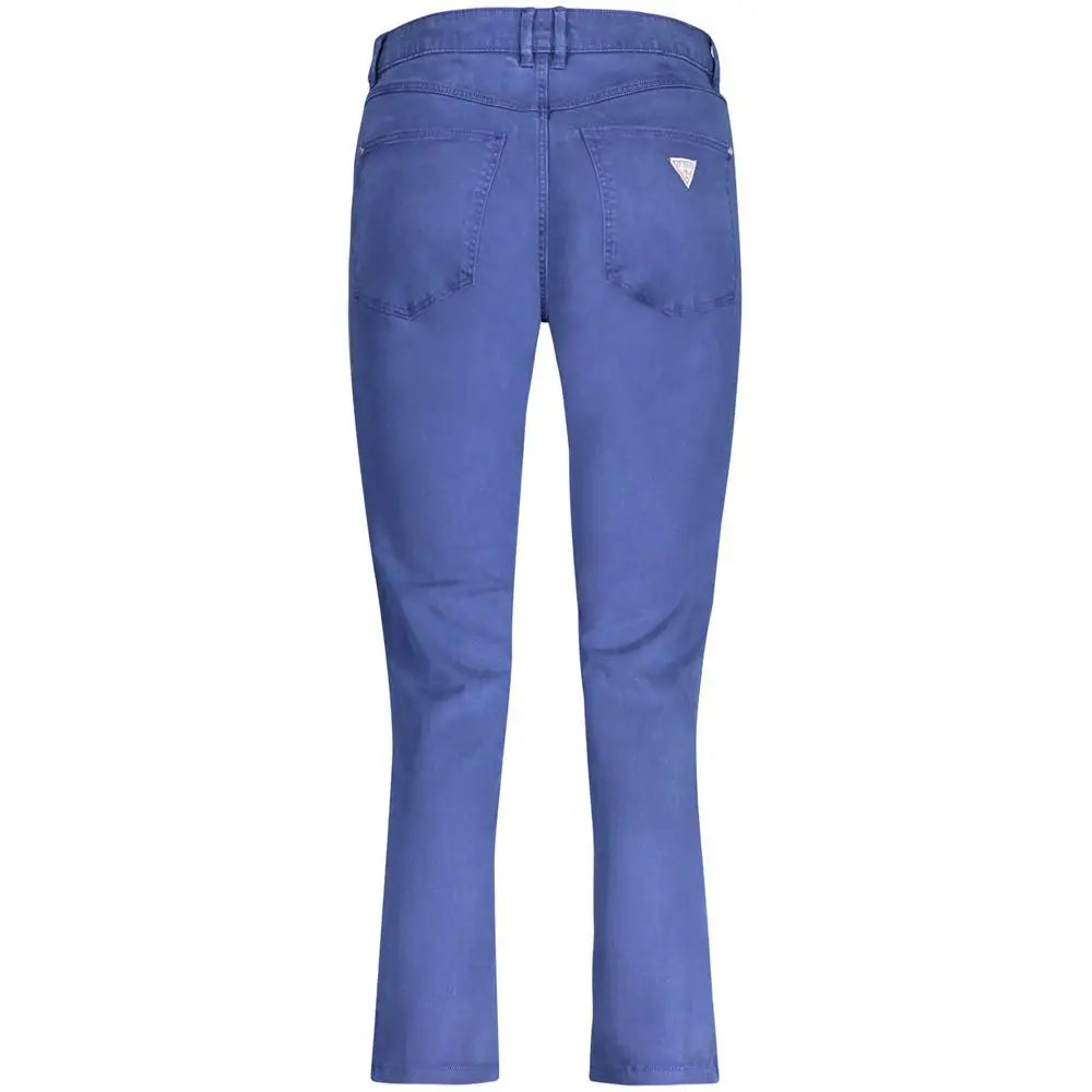 Jeans skinny en coton bleu guess pour femme vue de dos avec une légère décoloration et logo triangulaire blanc