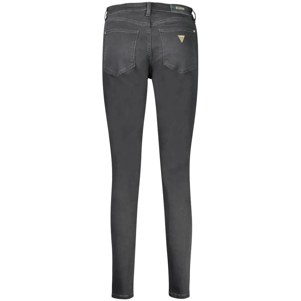 Jeans skinny guess en coton nero gris foncé à coupe slim avec logo brodé sur la ceinture arrière et la poche droite vue dos