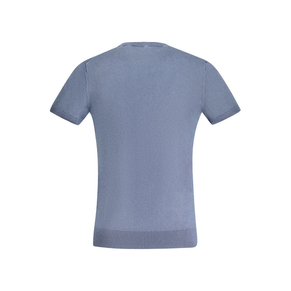 T-shirt homme Guess Jeans en coton bleu avec logo Guess, décontracté et confortable, porté sur mannequin.