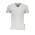T-shirt gris en coton pour homme de la marque Guess Jeans, coupe classique et design simple, visible sur l'image.