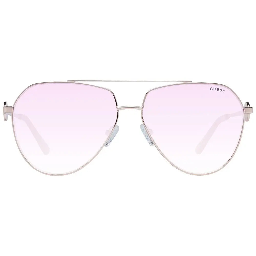 Lunettes de soleil aviator guess en métal rose doré avec monture argentée et verres dégradés roses logo sur la branche