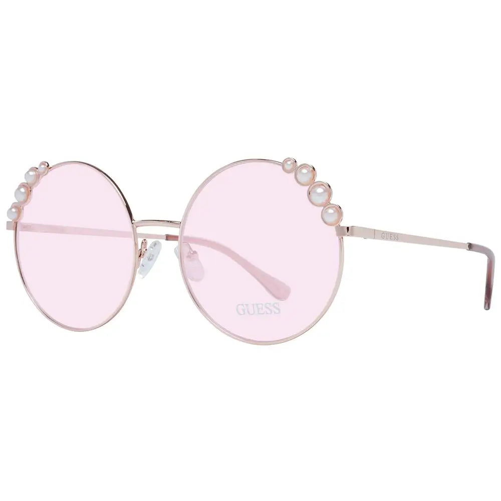 Lunettes de soleil rondes guess en métal rose gold avec verres roses et rangée de perles décoratives sur le dessus