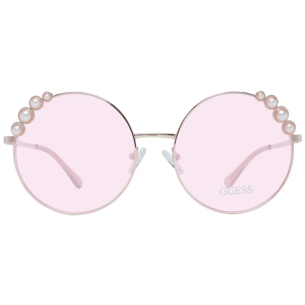 Lunettes de soleil Guess rose gold metal avec verres ronds roses et détails en perles sur la monture métallique