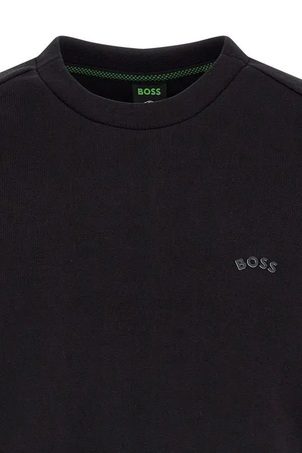 Sweatshirt noir en coton hugo boss avec broderie gris clair boss sur la poitrine et étiquette verte à l’intérieur du col